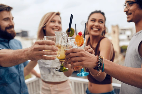 cheers on the rooftop bar